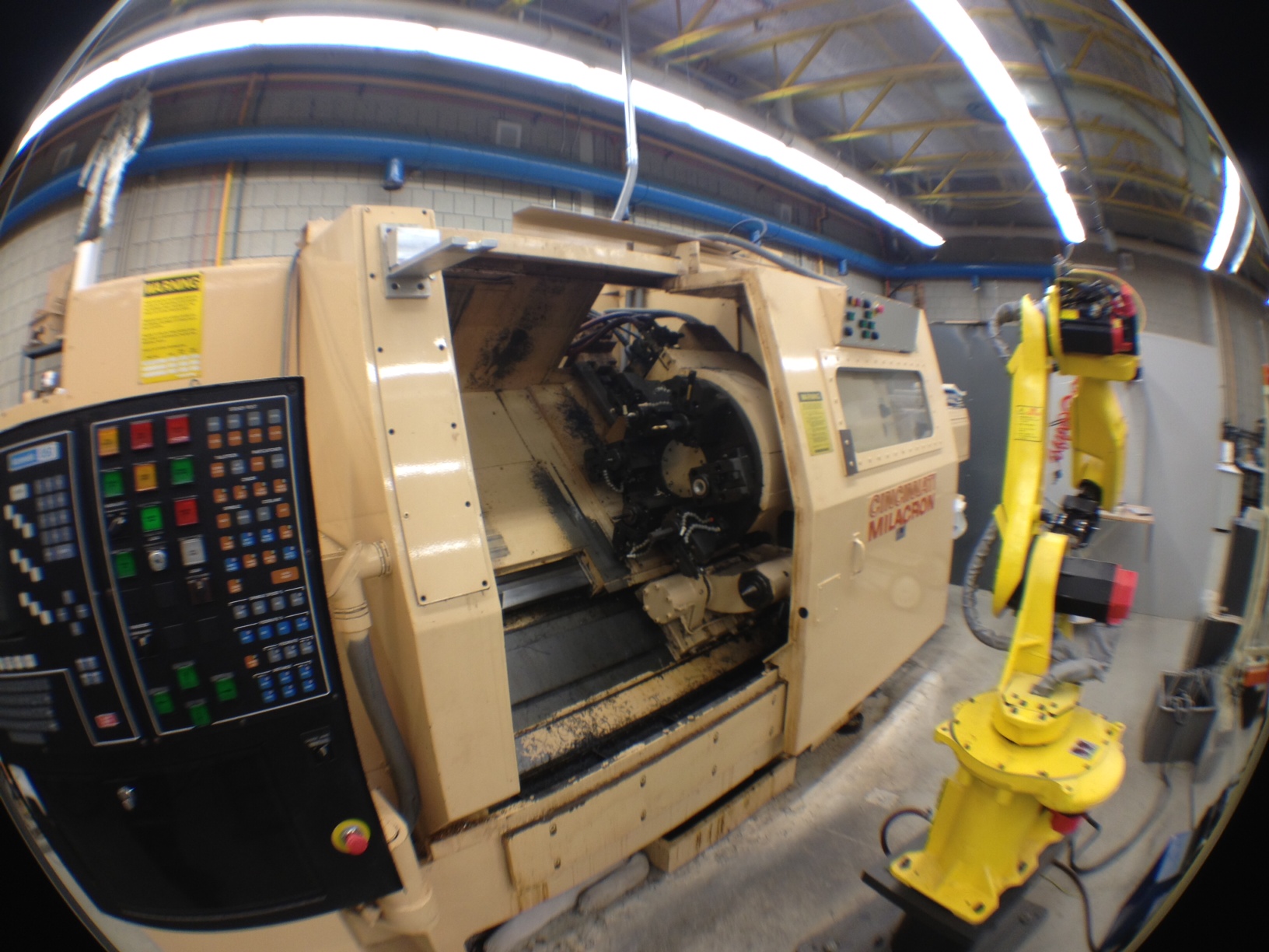 Robotic loader CNC