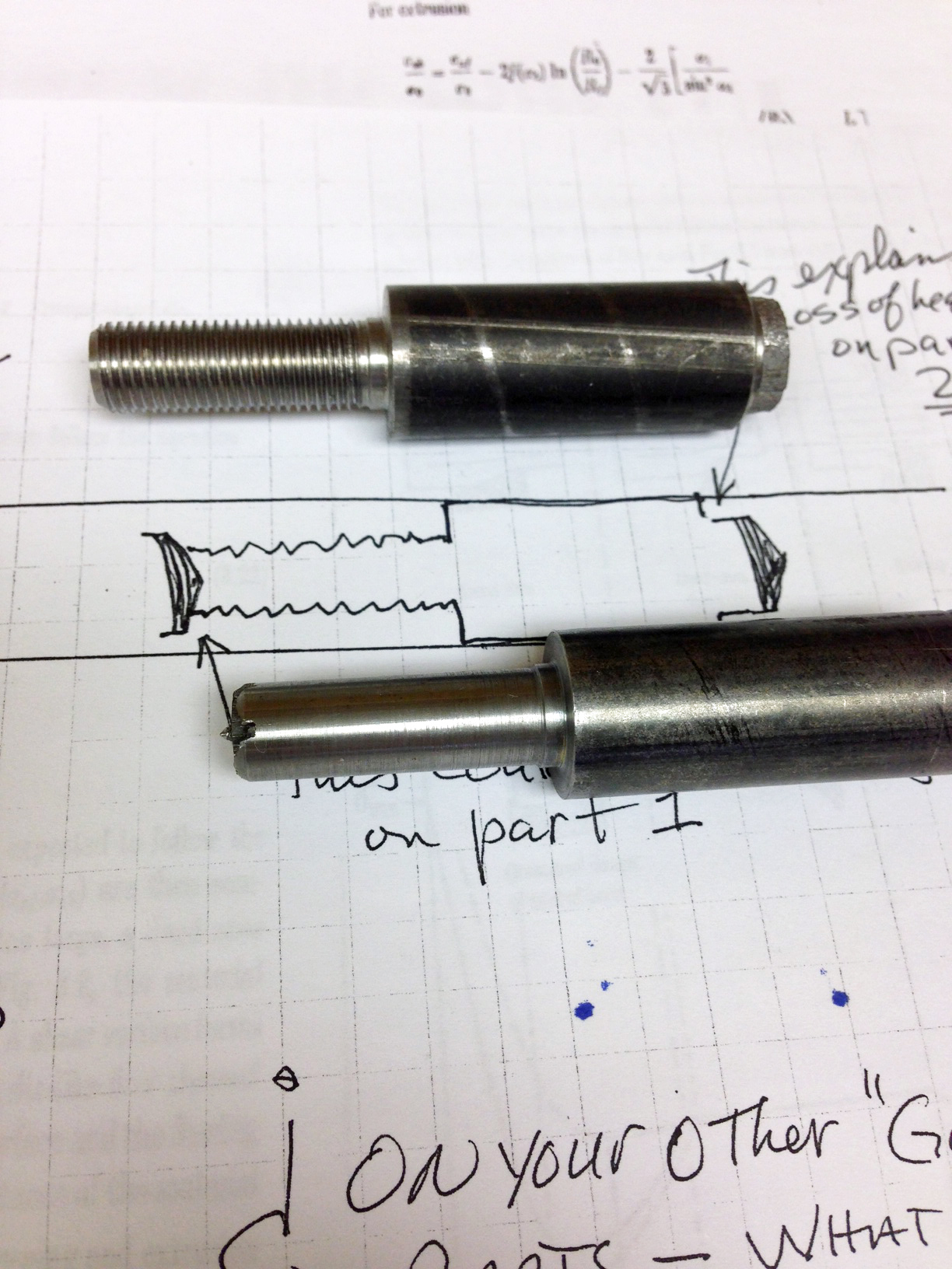 This figure shows how the prior existing ruptures could have existed in the bar as they are seen on the parts off the automatic screw machine.