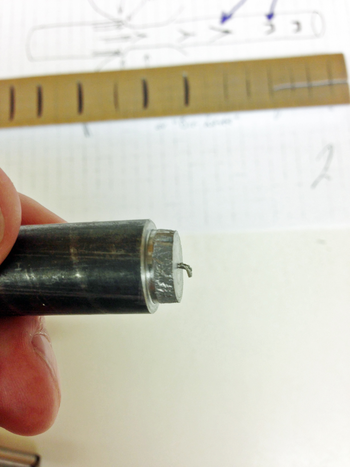 note prior existing rough fracture suface on stepped down diameter. This was prior existing central burst in the bar.
