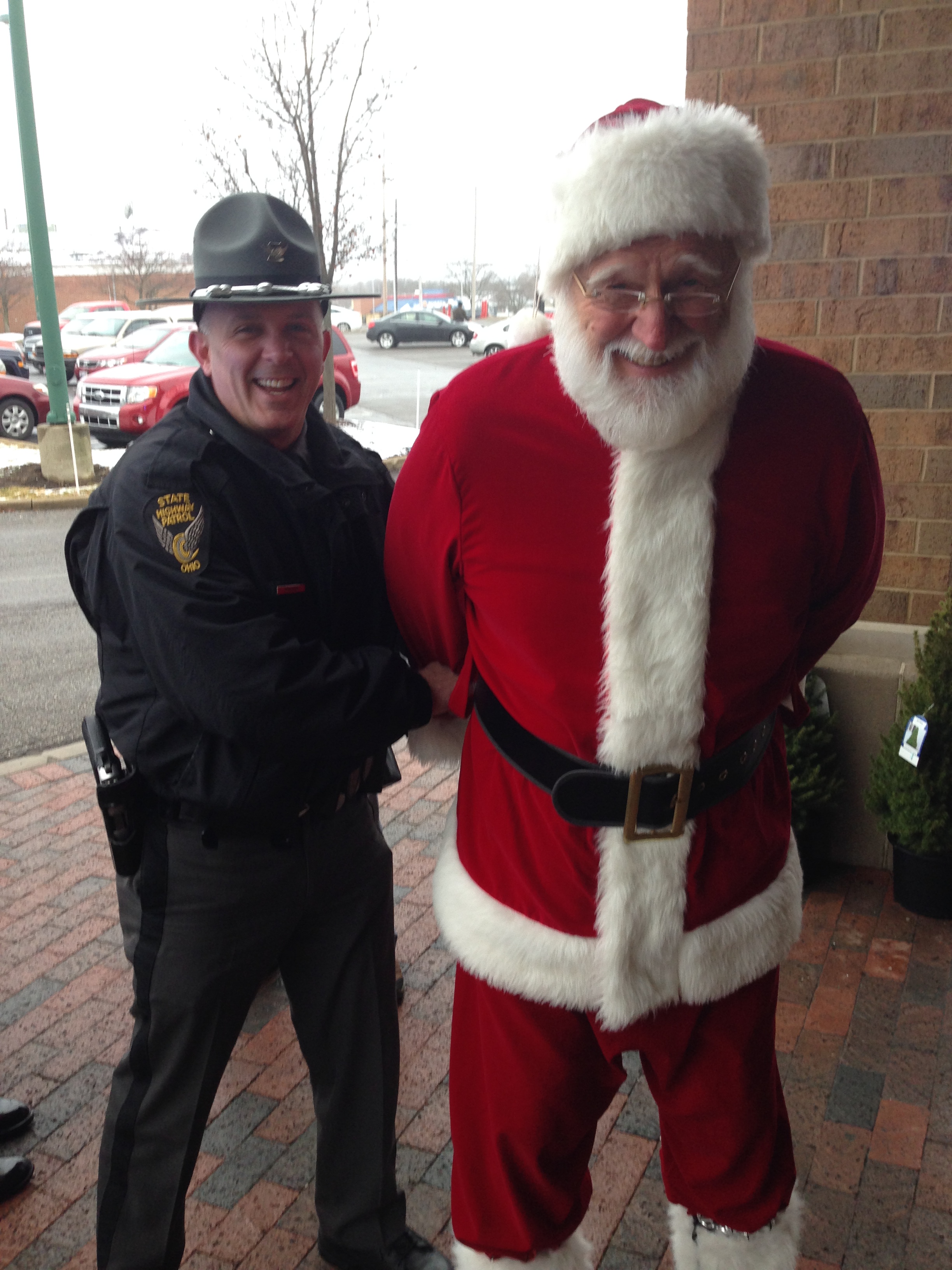 No telling on what the State troopers busted this jolly old elf for, but we bailed him out with donations to the local food bank...