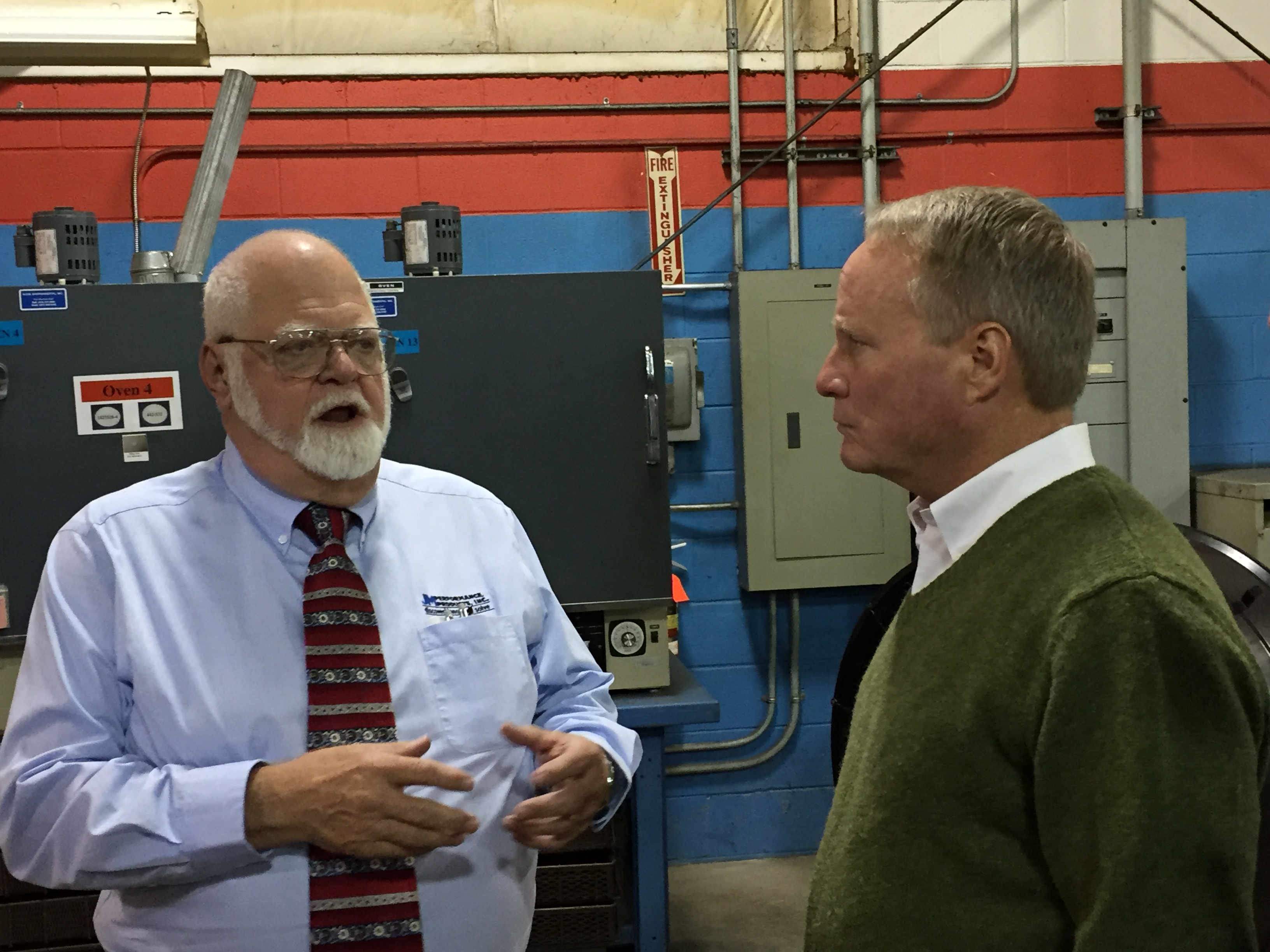 CEO John Stoneback and Congressman David Joyce in the Shop at JM Performance Products, Inc.