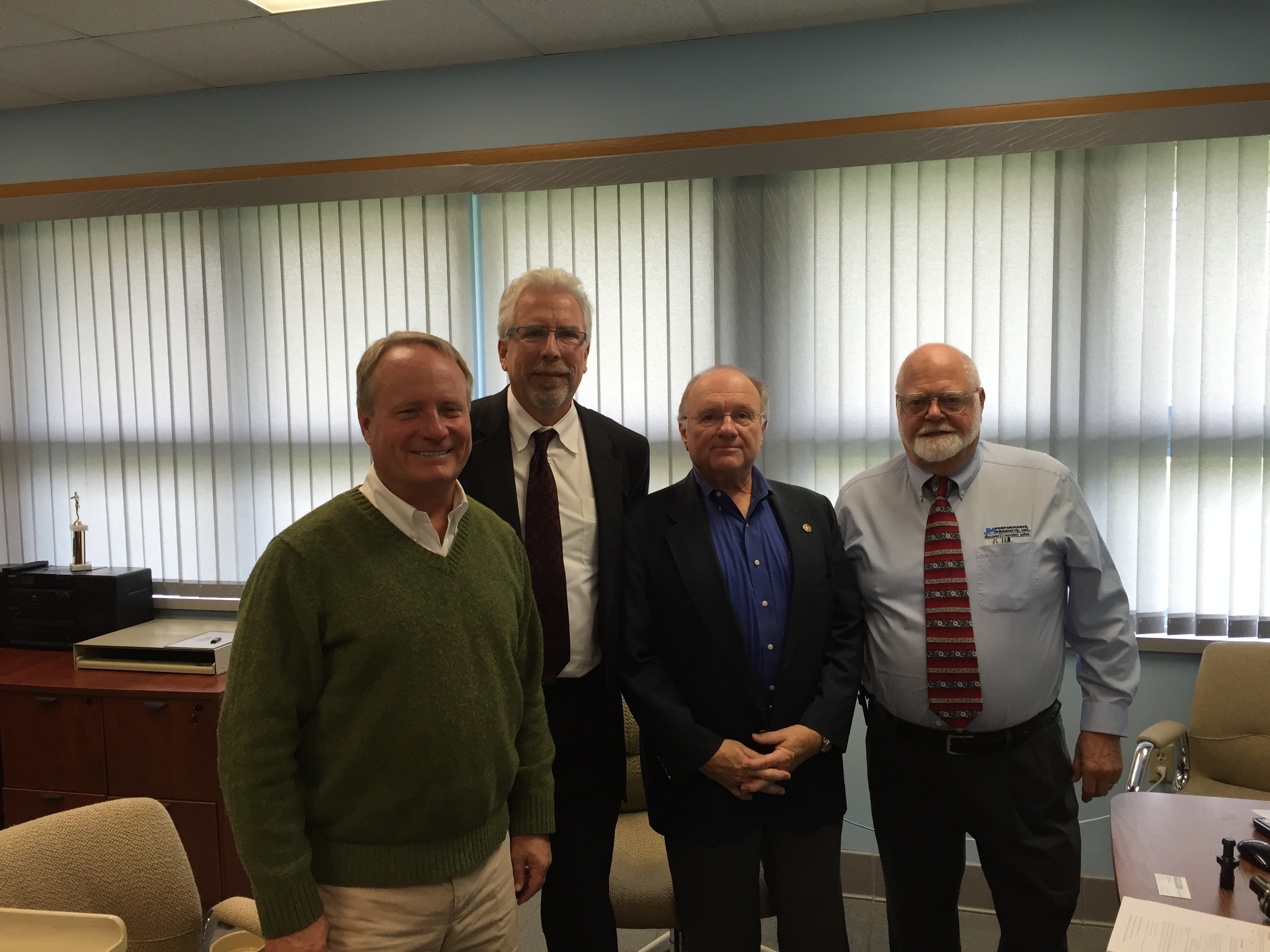 From left, Congressman David Joyce, Miles Free, PMPA, Roger Sustar AWT, And John Stoneback, JM Performance Products, Inc.
